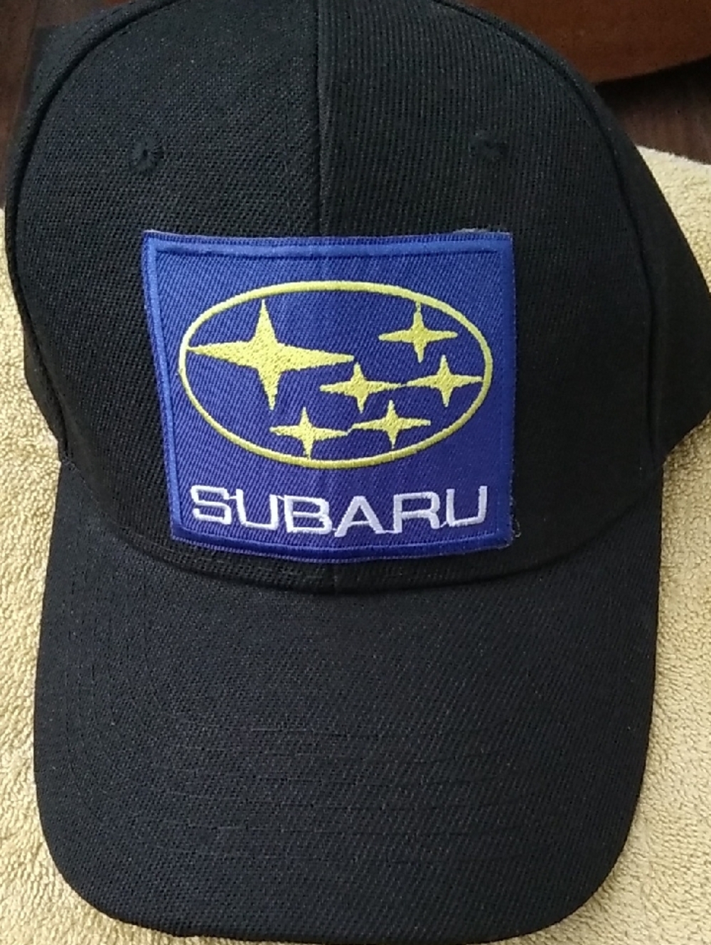 Black Subaru Patch Baseball Cap with Blue & Yellow Logo
